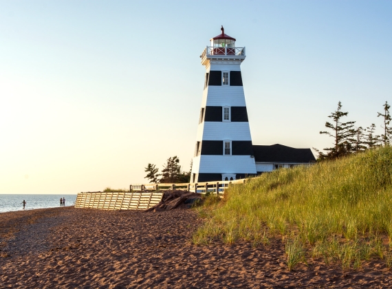 A lighthouse on a beach on PEI