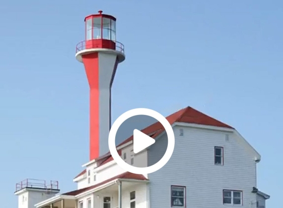 Lighthouse with a play button