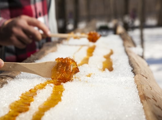 Roll maple syrup close-up - stock photo