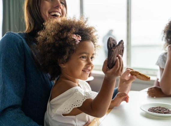 Child Holding Cookies